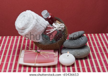 Spa background with hygiene and decorative items in red.