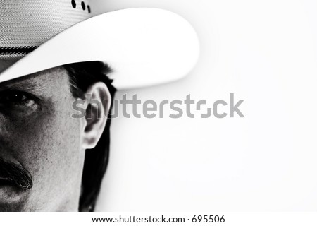 Half-face portrait of a cowboy in white hat against white background with shadow and light effect.