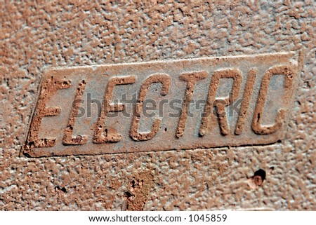 Grunge - Close-up of an Electric utilities cover.