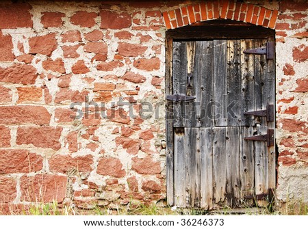 Vintage old door and wall of authentic 19th century architecture in a setting of the real American Old West.