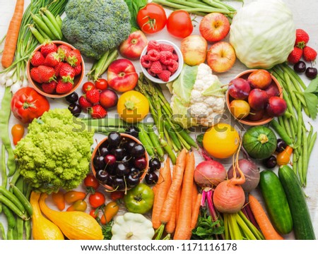 Summer fruits vegetables berries background, apples cherries peaches strawberries cabbage broccoli cauliflower squash tomatoes carrots spring onions beetroot, copy space, top view, selective focus