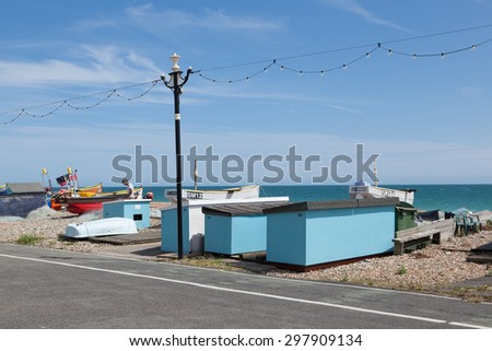 SOMPTING, ENGLAND - JULY 18. Fishing boats on the beach, between Sompting and Worthing, West Sussex, England on July 18, 2015