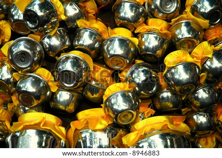 An abstract of pots containing milk hanging seen in an Indian (Asia) religious festival.