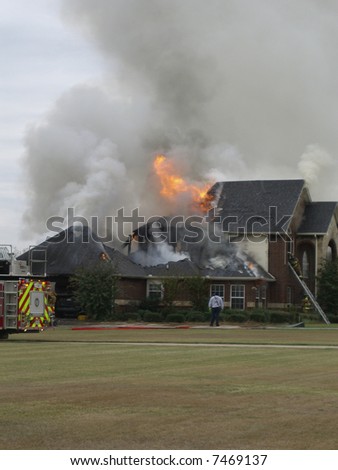 Firemen responding to house fire