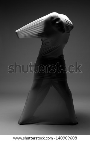 Horror Image of a Woman Trapped in Fabric