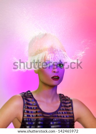 Creative Concept of Woman and Water Splashing on Top of Her Head