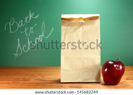 Back to School Lunch Sack Sitting on Teacher Desk