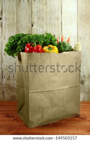 Bagged Grocery Produce Items on a Wooden Plank