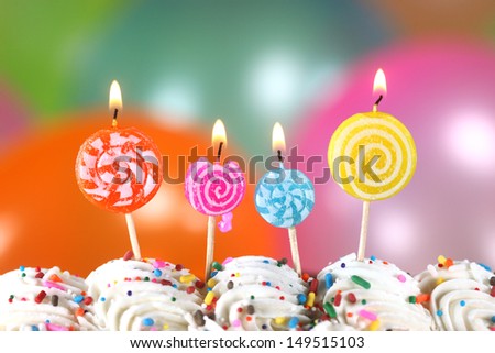 Happy Birthday Celebration with Balloons Candles and Cake