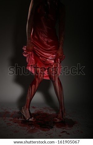 Horror Image of a Woman Dripping in Blood Wearing Prom Dress