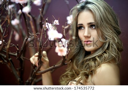 Very Pretty Young Lady With Cherry Blossoms
