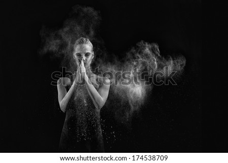 Beautiful Woman With Stop Motion of Explosive Powder Captured by Flash