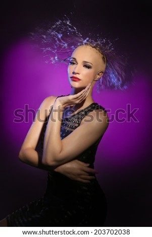 Beautiful Woman With Water Splashing Onto Her Head in the Shape of Hair