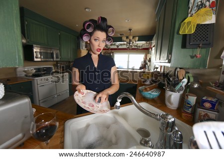 1950 Era Housewife Doing Her Daily Chores