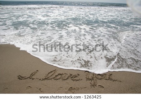 stock photo : Beach Ocean Sky Background With I Love You in Sand