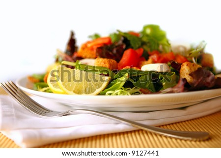 Delicious Salad With Fork and Napkin