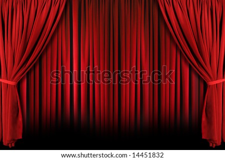 Red draped theater stage curtains with light and shadows