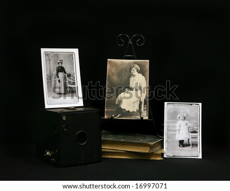 Vintage Photographs from 1910 era With Books and Vintage Pinhole Camera.