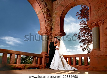 Happy Couple on Their Wedding Day Outdoors