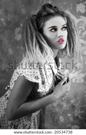 Blonde Model in Black and White With Pink Lips and Yellow Eyeshadow