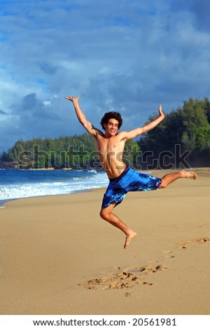 Excited Teen Jumping for Joy at the Beach