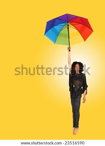 African Woman Falling While Holding an Umbrella on Yellow Background