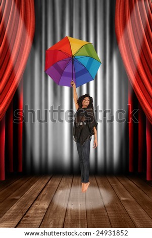 Woman on Theater Stage With Umbrella Singing