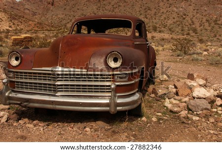 Horizontal Image of a Rusted Out Old Americian Classic Vehicle