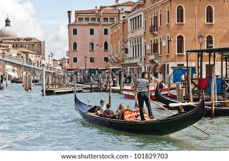 Gondolier on Venice Grand Canal