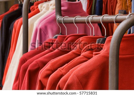 Fleece jackets hanging on clothes hangers