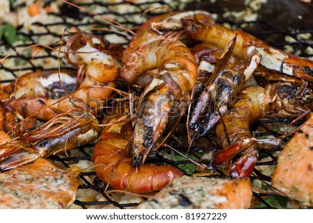 Barbecued giant shrimps on the wok pan