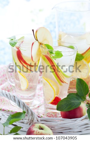 Apple drink with lemon,mint and ice cubes