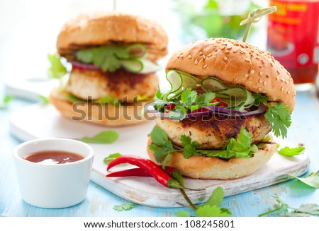 Thai chicken burger with cucumber and sweet chili sauce