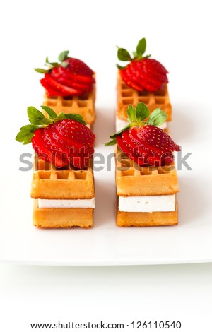 belgian waffles with fresh strawberries and cream