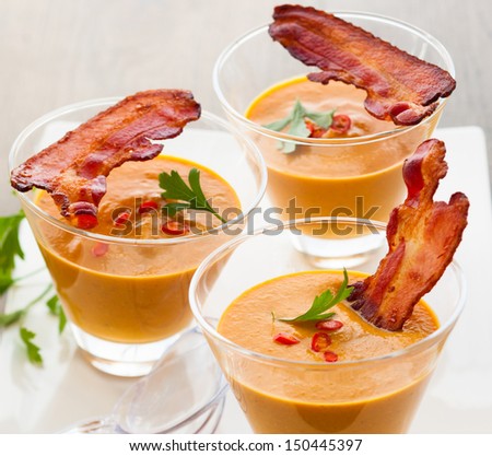 Pumpkin Soup With Bacon In Glasses