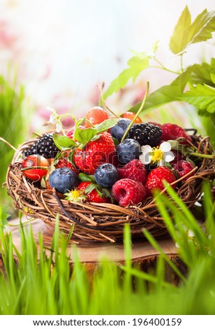 A basket of mixed summer berries