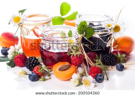 Apricot ,blackberry and strawberry jam on white background.