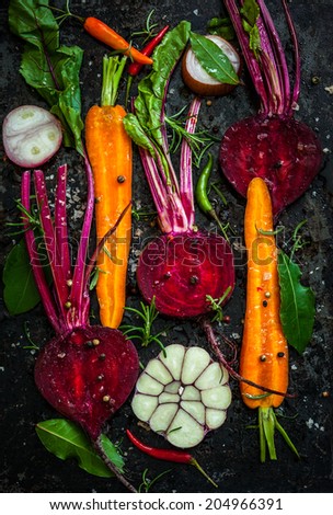 Raw vegetables for roasting, on a baking tray
