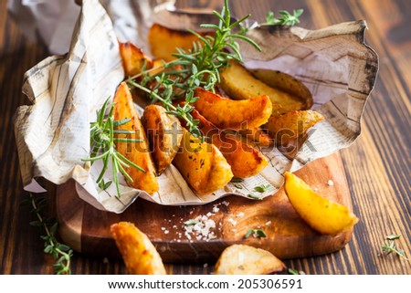 Roasted potato wedges with herbs and salt