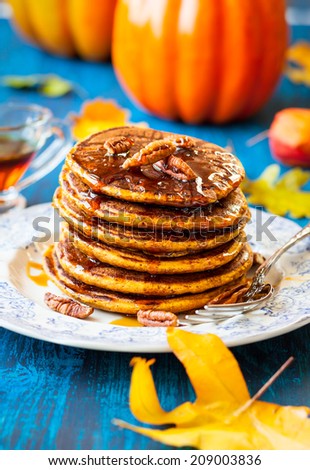 Spiced Pumpkin pancakes with maple syrup and pecan