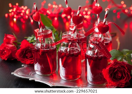 Valentine\'s Day party idea:individual small bottles with cranberry cocktail