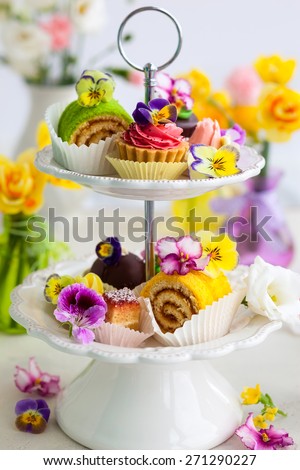 Assorted cakes and pastries on a cake stand for afternoon tea