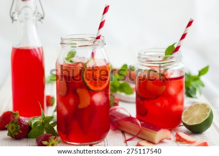 Preparation homemade refreshing  strawberry,lime and rhubarb lemonade with mint