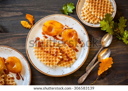 Delicious dessert : Caramelized pears with waffles and caramel sauce