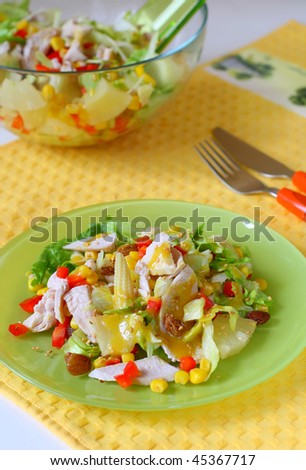 Salad with boiled chicken meat,pineapple,raisin and corn with honey-mustard  sauce. Topped with sesame seeds
