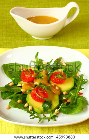 avocado salad with tomatoes,pine nut and honey-mustard sauce