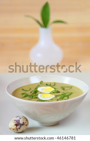 spinach soup with quail\'s egg