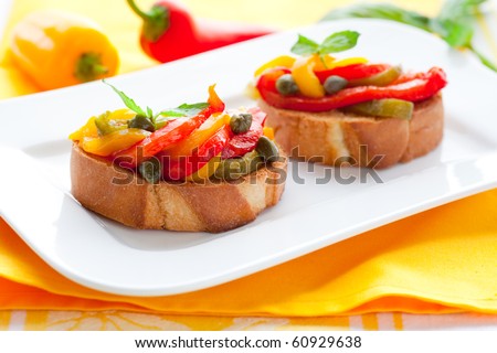 Bruschetta with roasted bell pepper,capers and basil