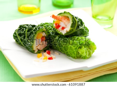 savoy cabbage leaves stuffed with prawns,rice and vegetables