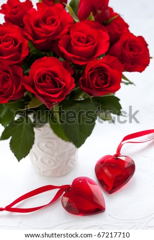 stock photo : red roses in vase and hearts for Valentine's Day